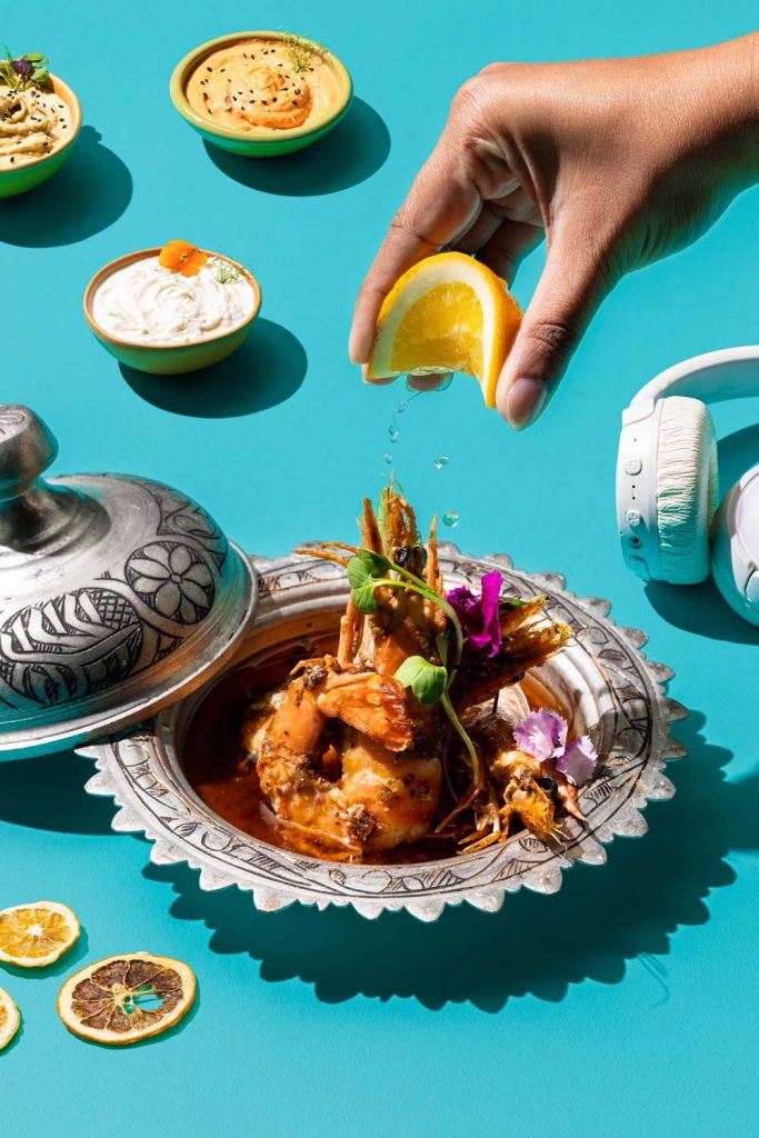 Tabletop Food Styling and Props Styling of a delicious prawn dish in a pretty silver plate