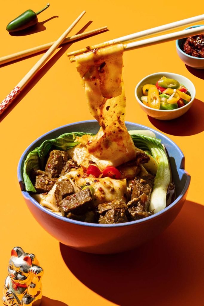 noodle pull on a bright background