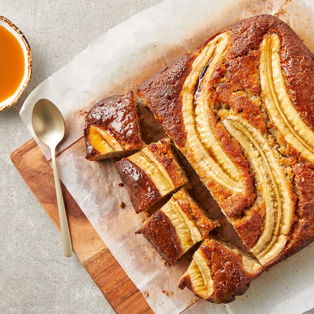 delicious whole banana blondies cake with caramel sauce
